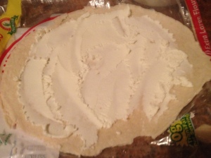 Spread desired amount of goat cheese on each tortilla.  